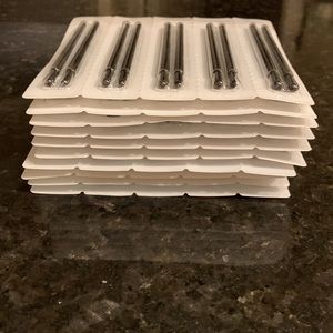 10/$30 Ten packages of small brushes for eyes